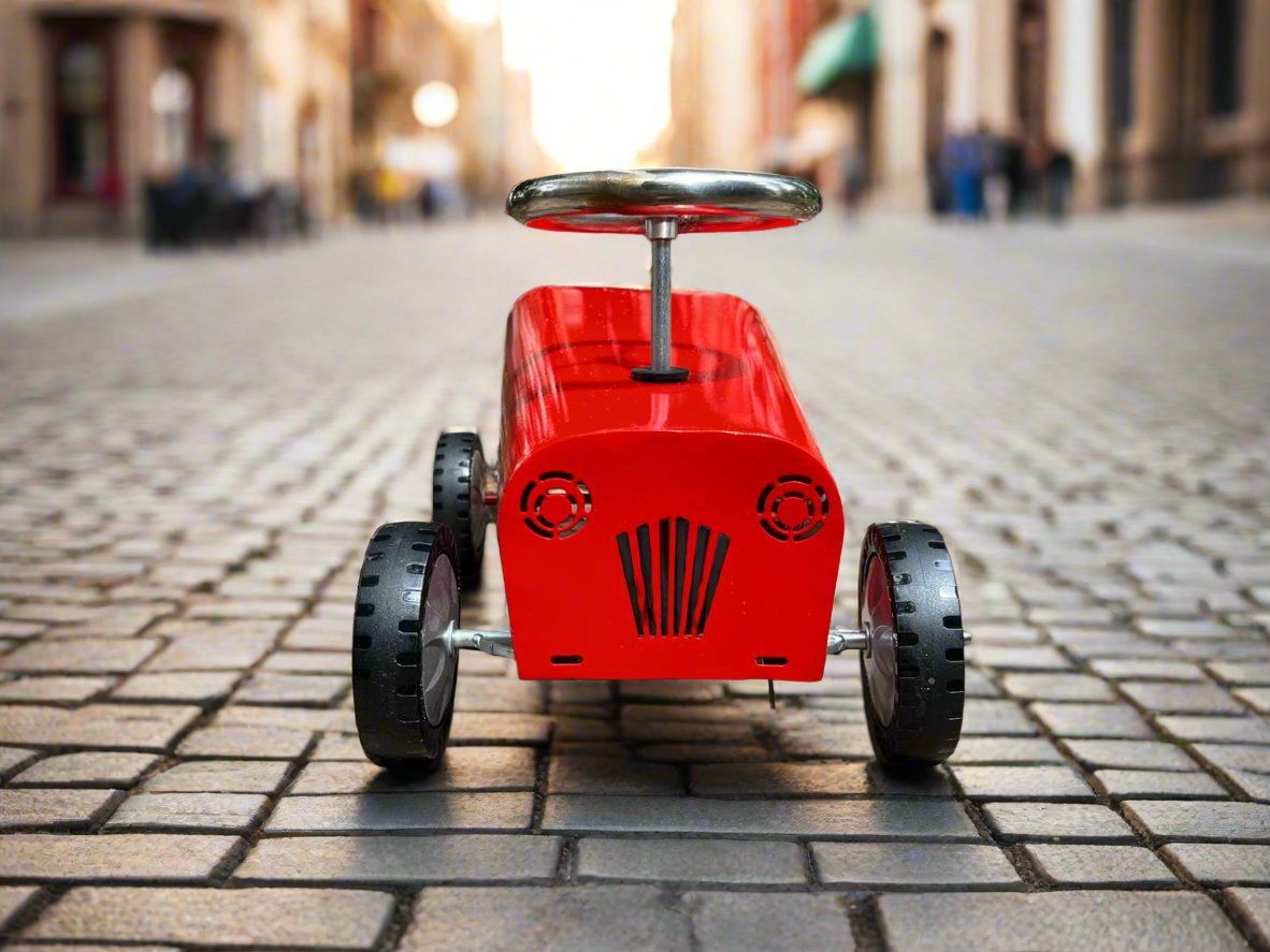 front view of baby toy car, its red in colure and amazing design 